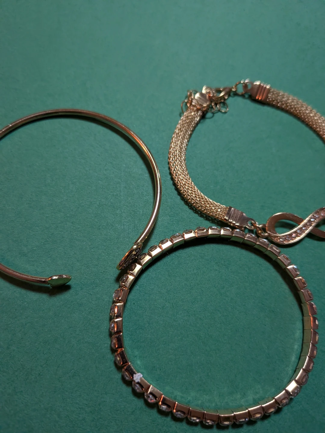Free cycle. 3 Gold Tone Bracelets With Charms/ Rhinestones.