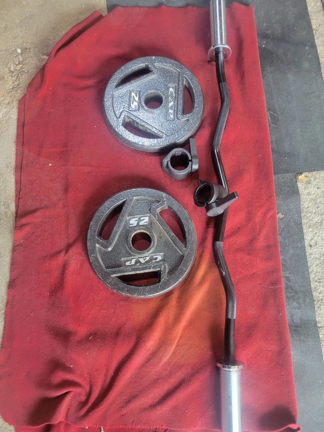 2" HOLE  EZ-CURL BAR. CAPS 25LB PLATES TOTAL 50lbs