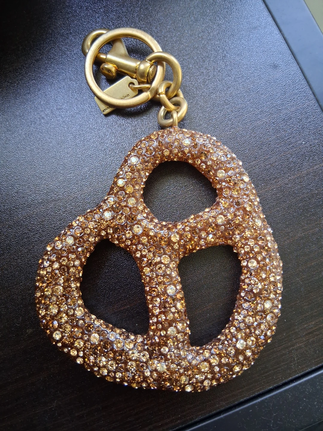 Coach crystal pretzel charm