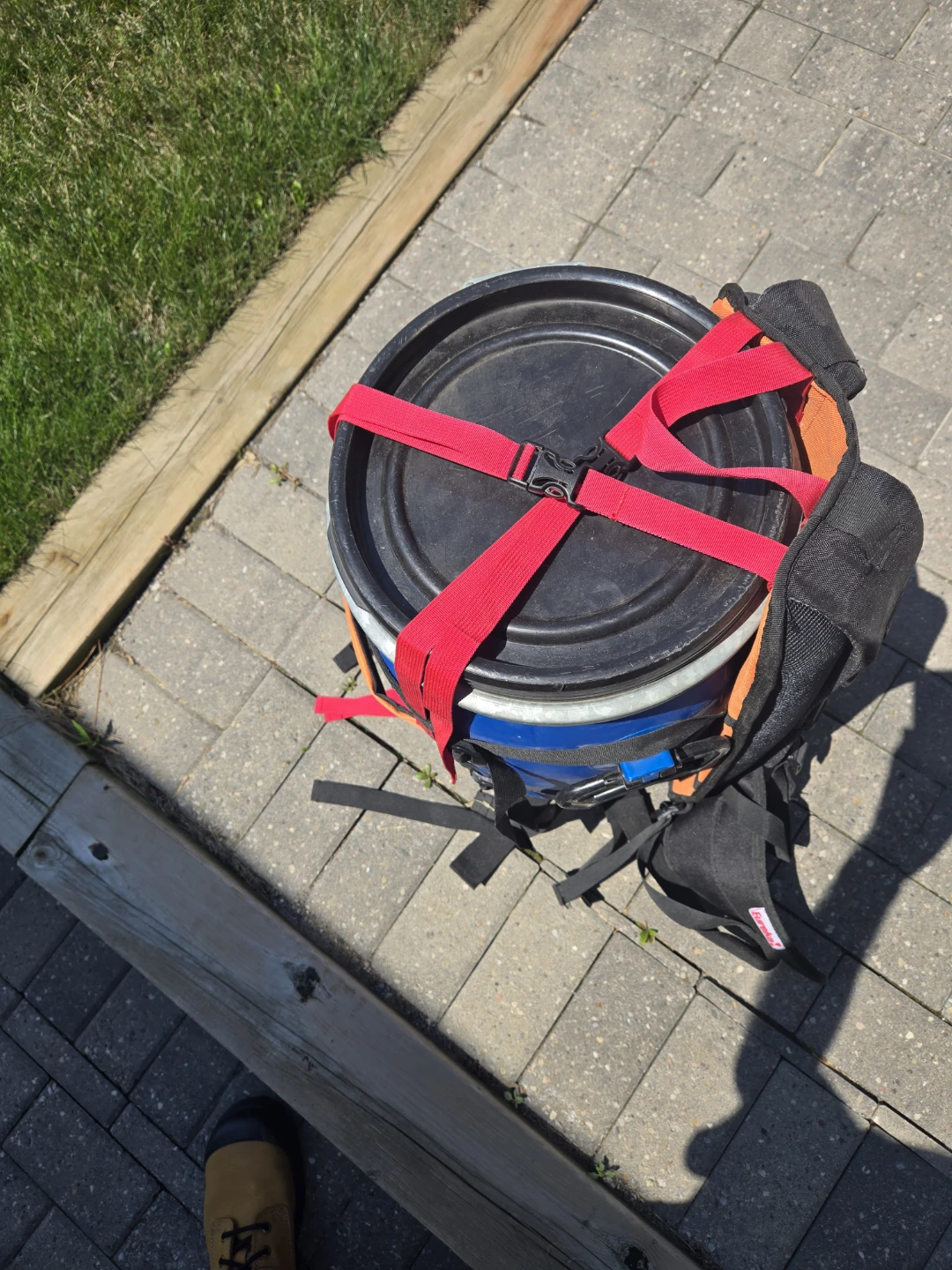 Blue Drum Backpack with Red Straps