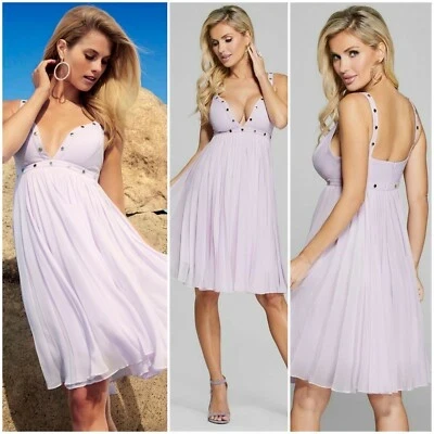 Brand new Marciano Trinity Dress with Chiffon material