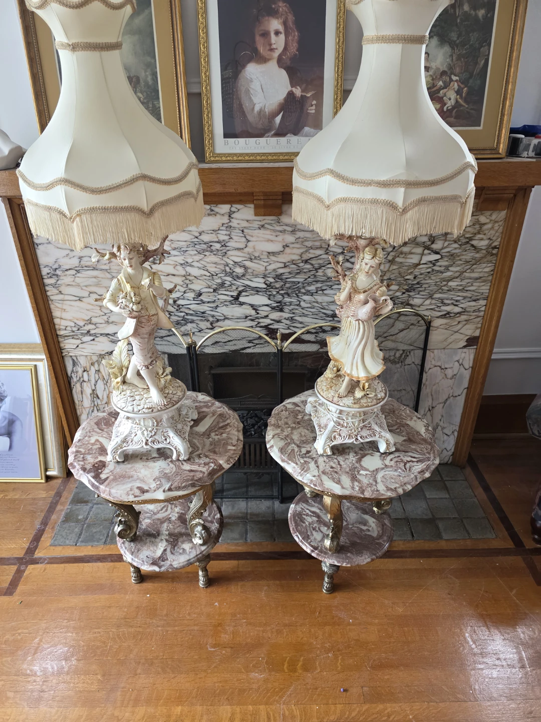 Pair of Vintage Figurine lamps with marble tables..