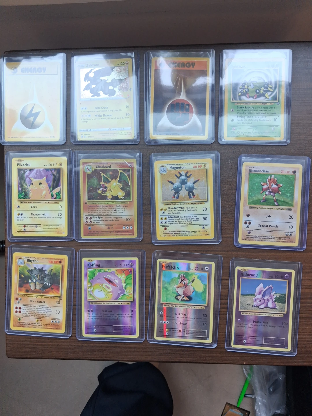 Assorted Pokémon Cards: Pikachu, Charizard, Zekrom, and more!