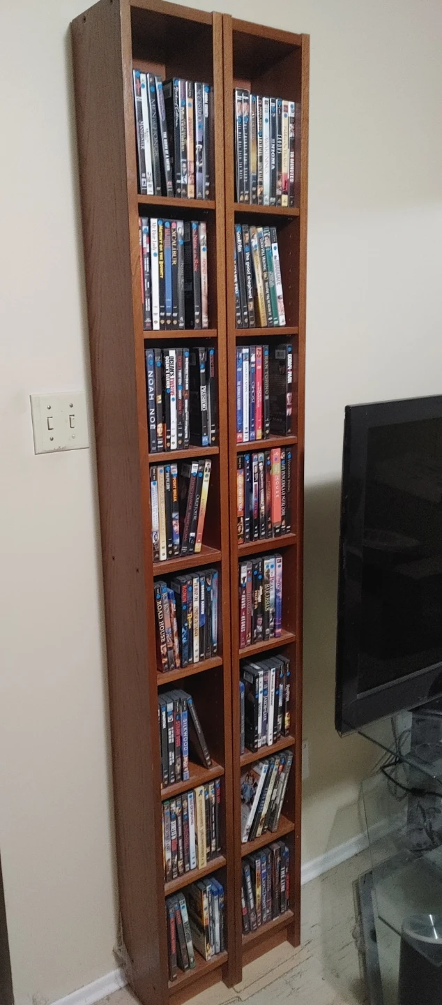 Wooden Bookshelf with dvds collection