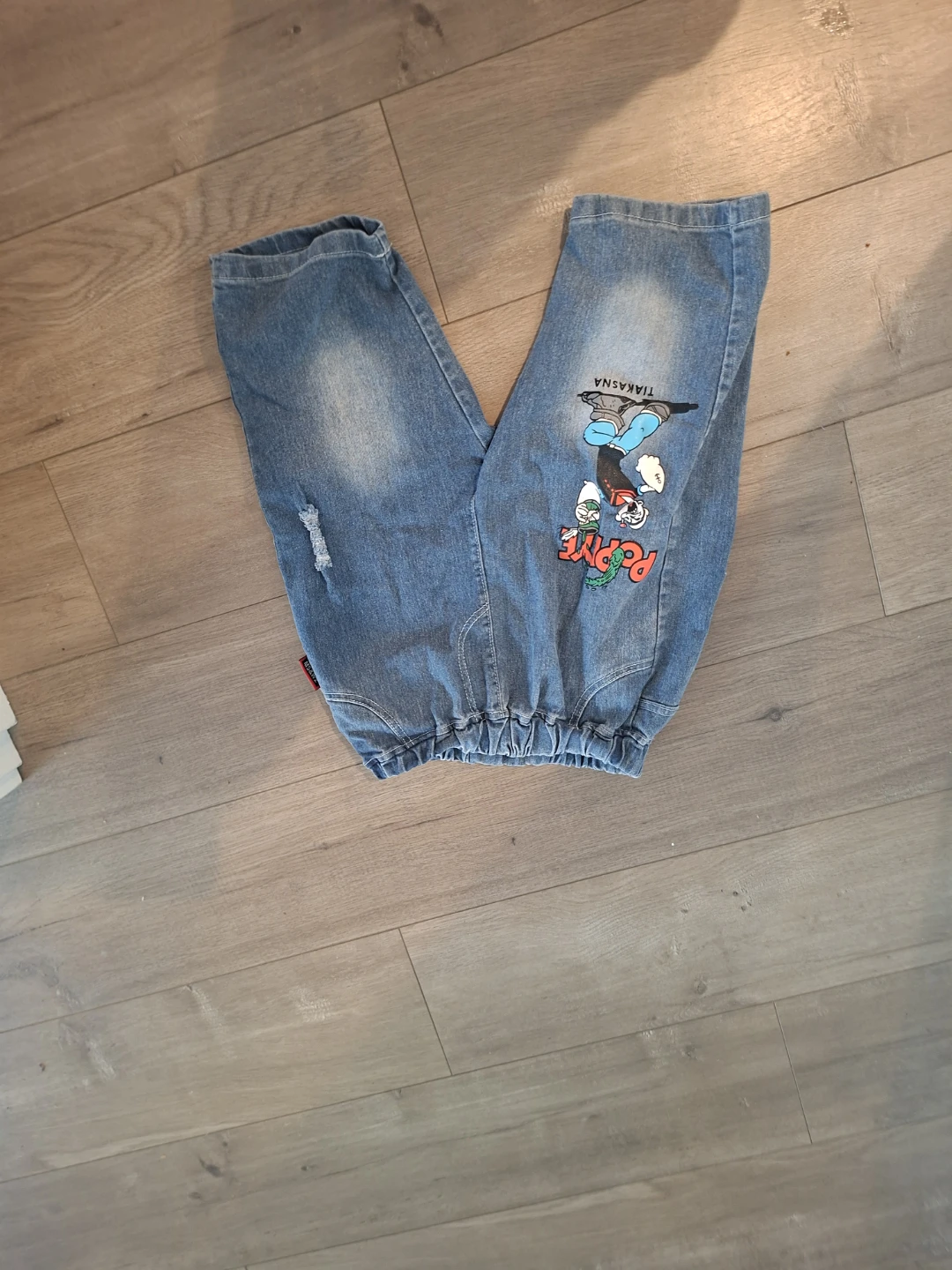 Blue Denim Jeans with Cartoon Graphic