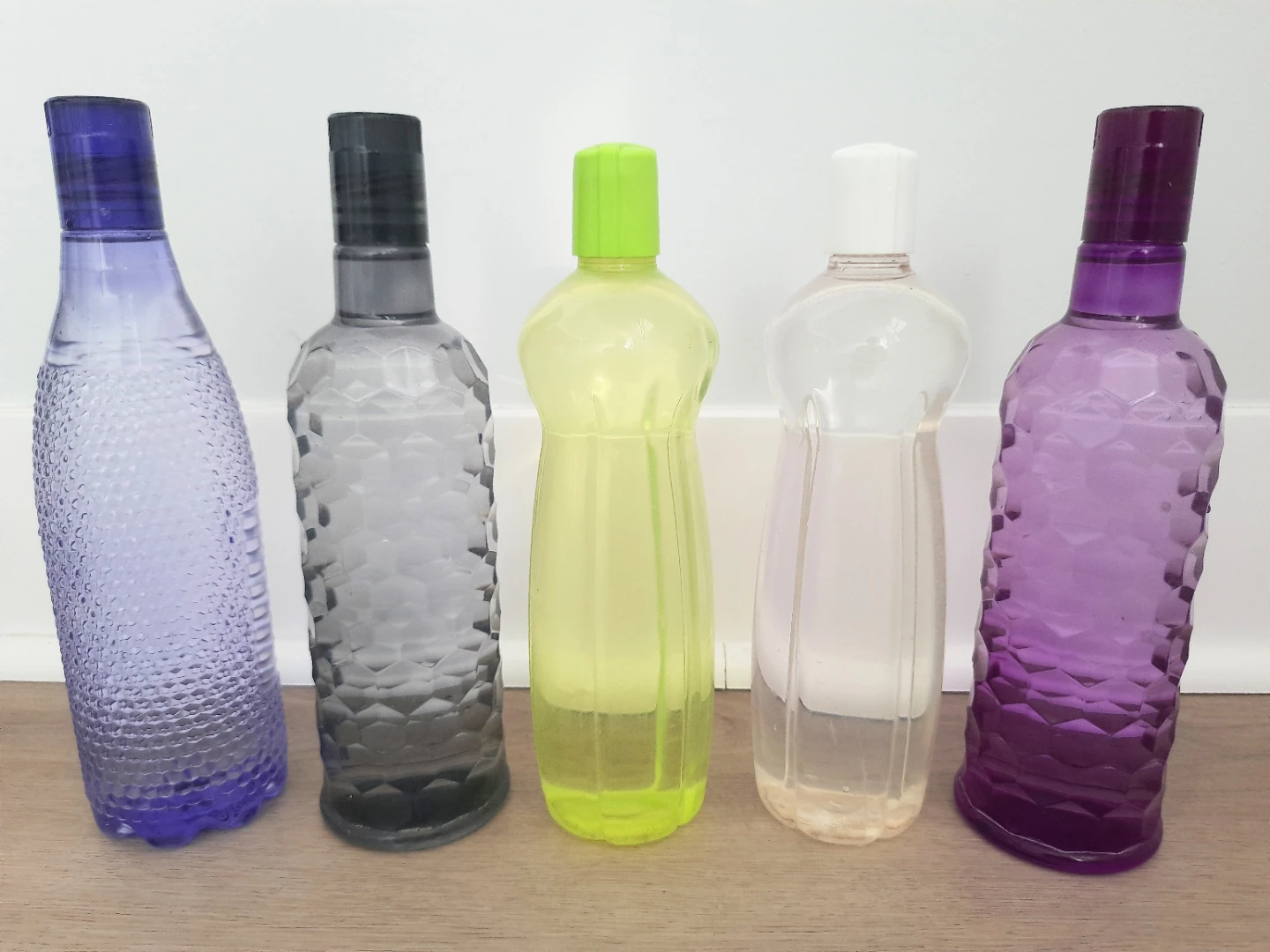 Set of 5 colourful plastic water bottles