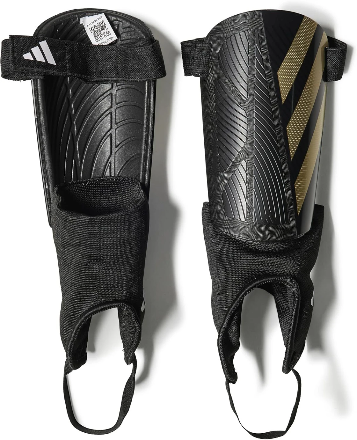 Adidas black and gold shin guards