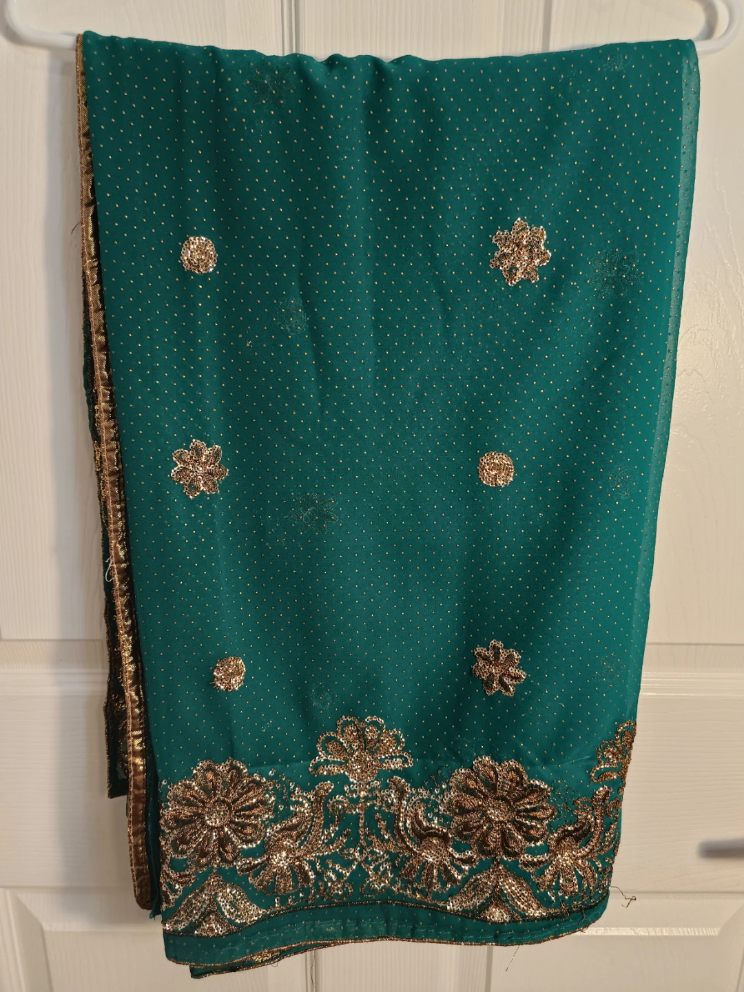 Teal Green Saree with Gold Embellishments