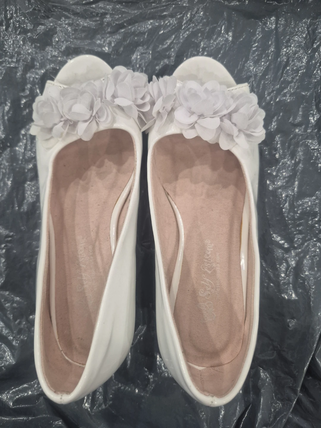 White Ballet Flats with Flower Embellishments