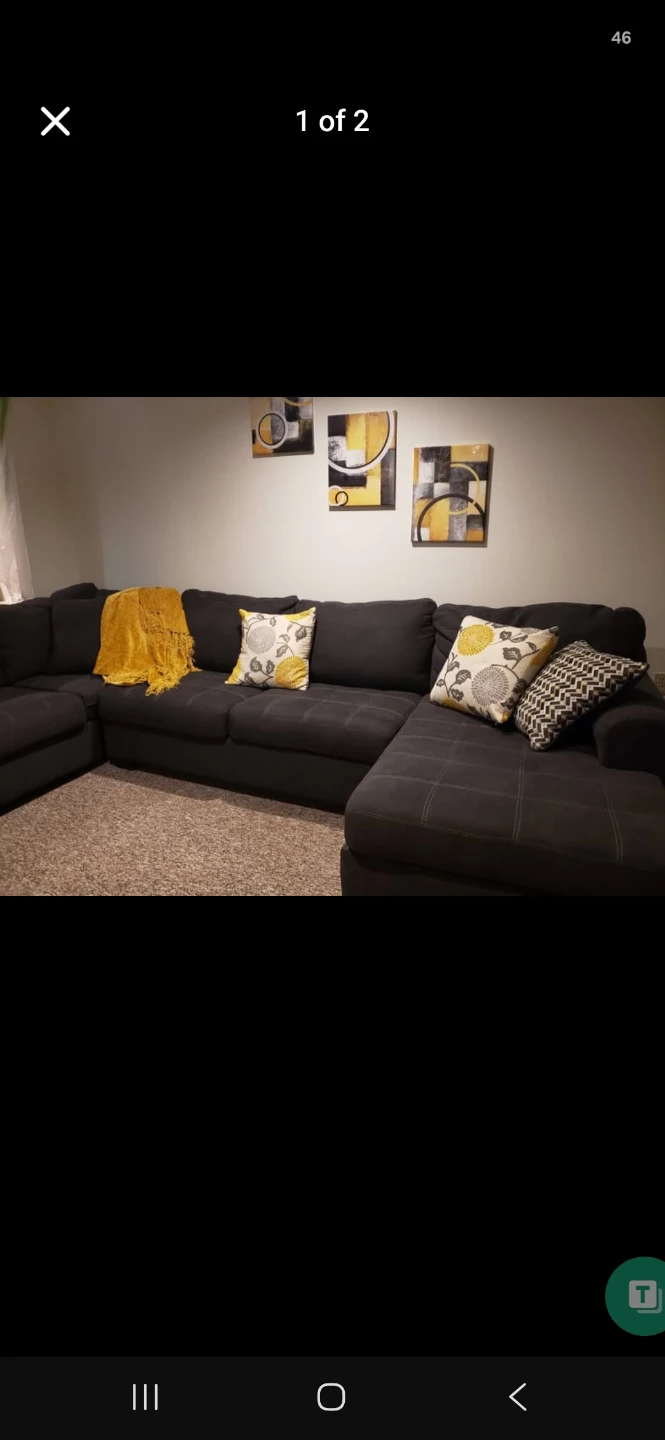 Dark Gray Sectional Sofa with Yellow Throw