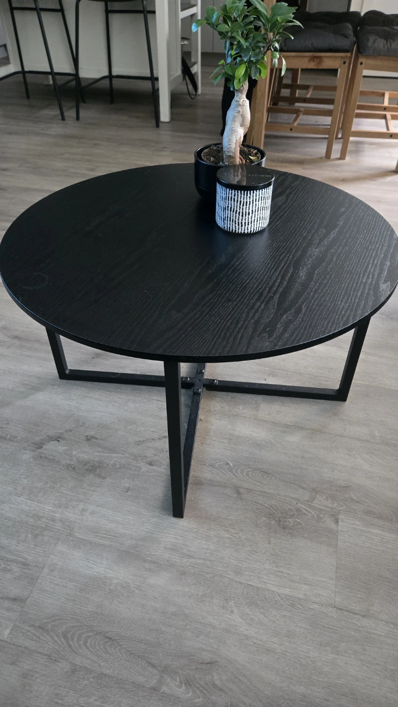 Round coffee table with black wood top and metal base - photo 2
