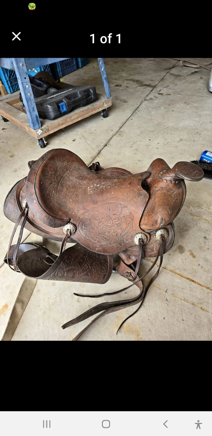 Vintage tooled leather western saddle