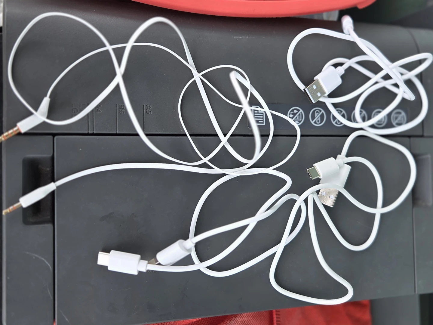 Assorted White Charging Cables and Earbuds - photo 4
