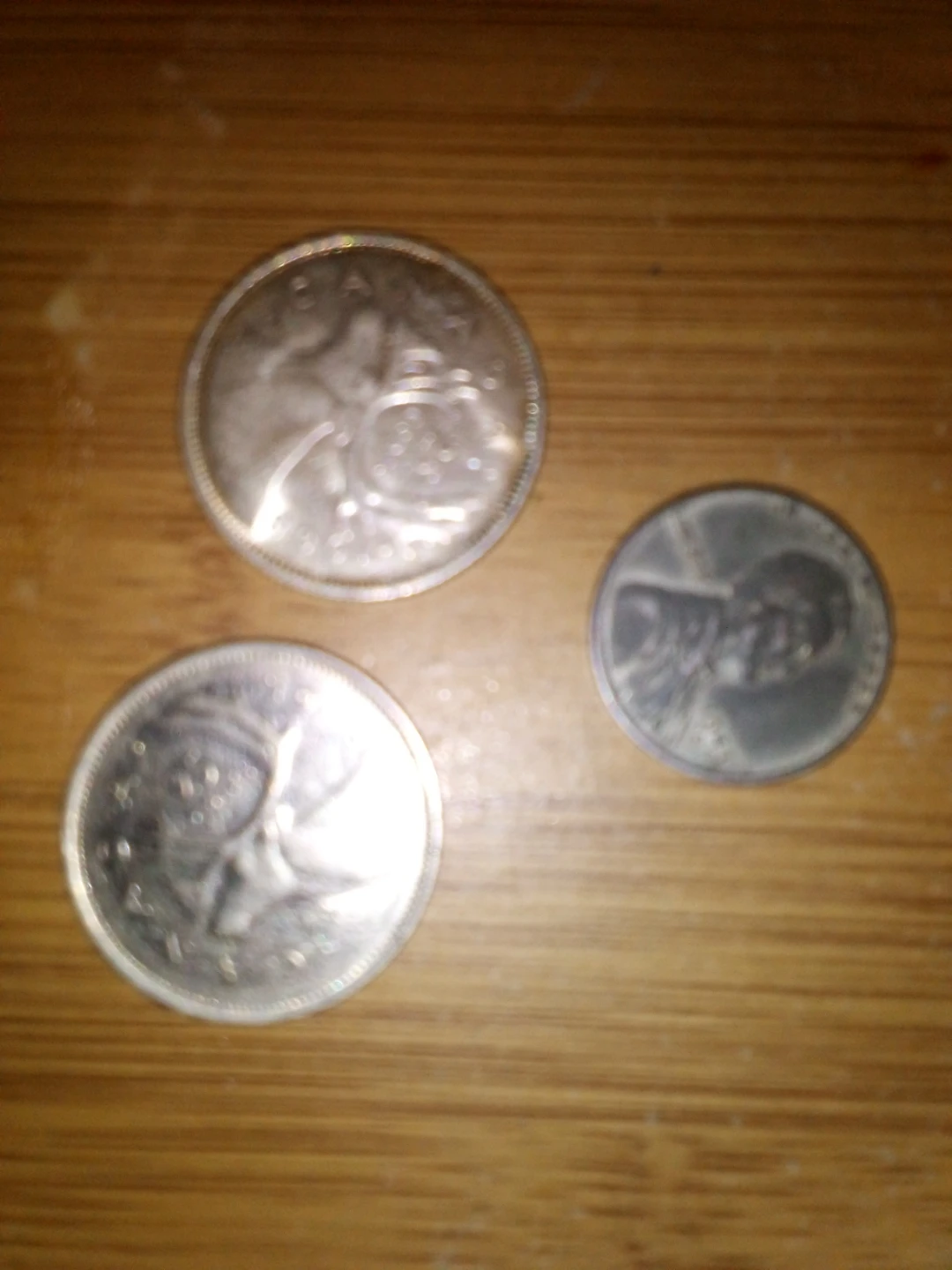 Three assorted coins one 1943 steel penny