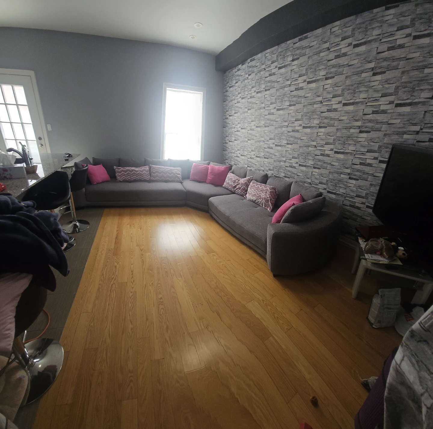 Grey Sectional Sofa with Pink Pillows