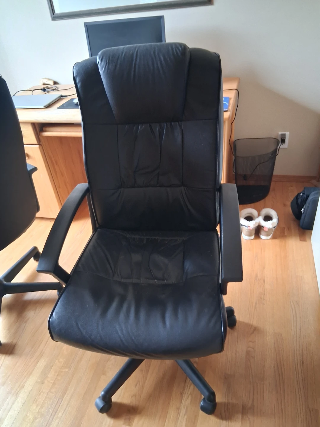 Black faux leather office chairs