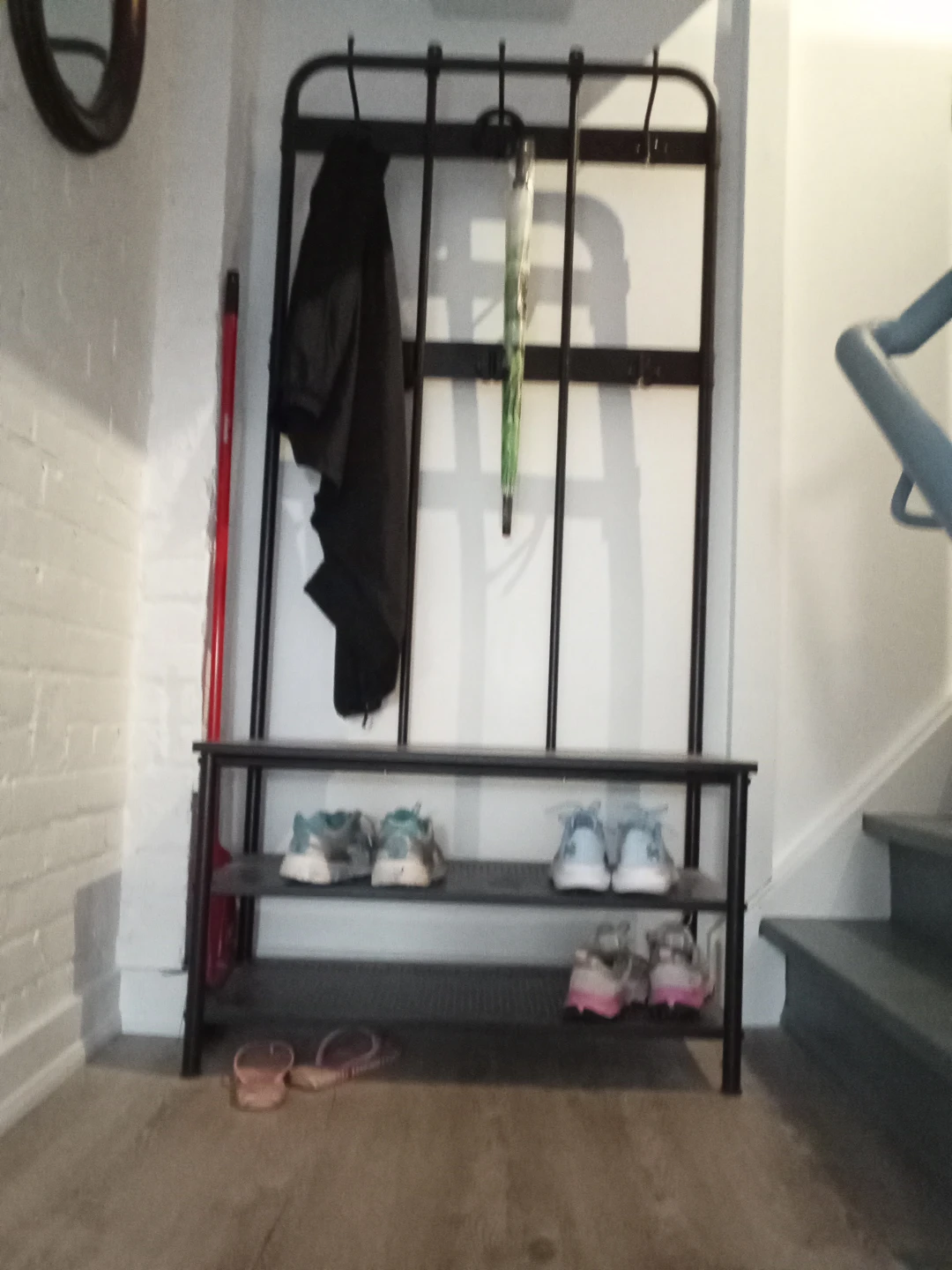 Ikea metal entryway bench with shoe organizer and jacket hooks