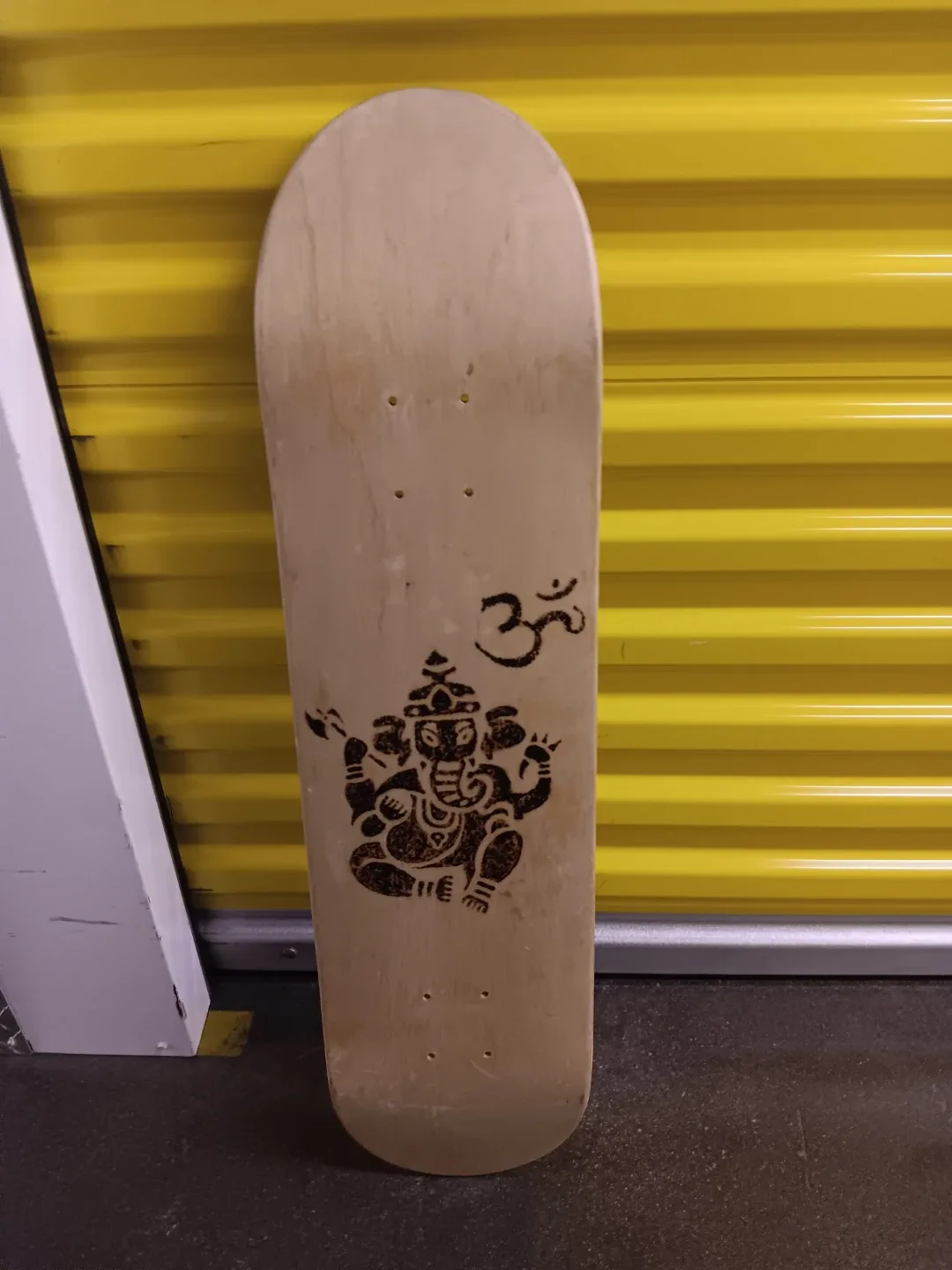 Blank Skateboard Deck with Ganesha and Om Design