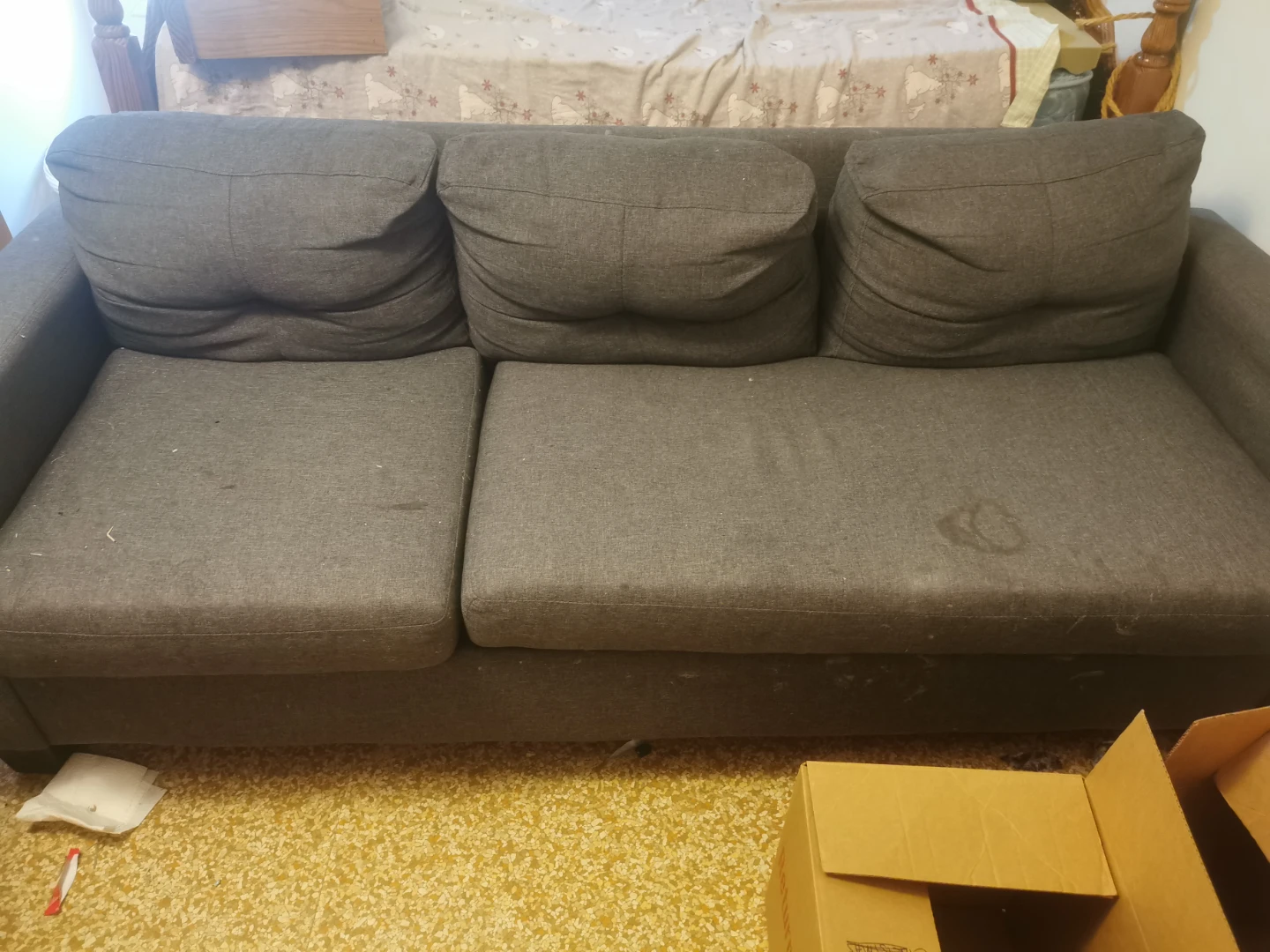 Grey three-seater sofa