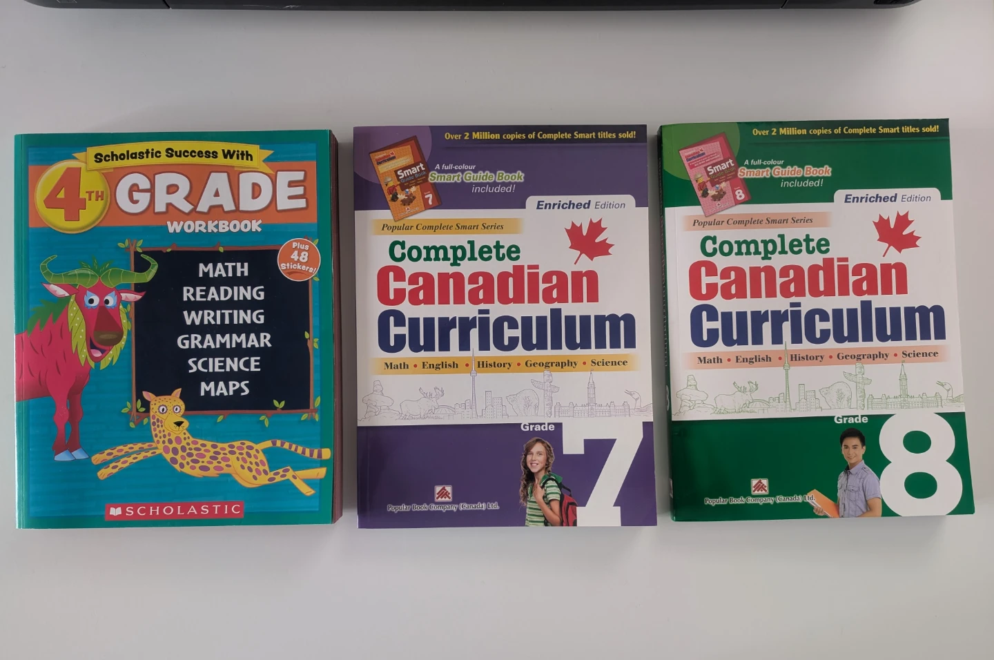 Scholastic Workbook & Canadian Curriculum Books (Grades 7 & 8)