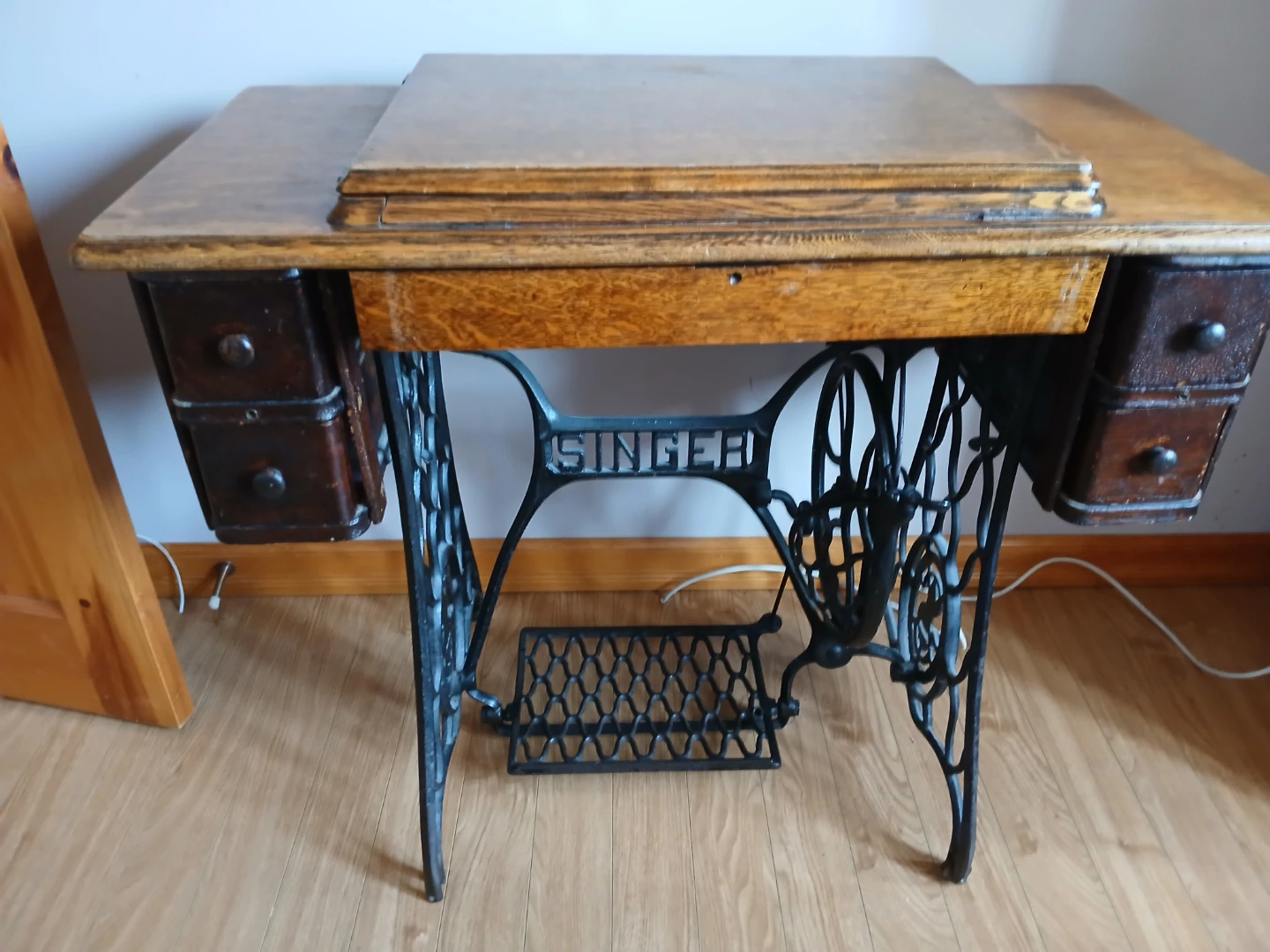 Singer vintage treadle sewing machine with cabinet