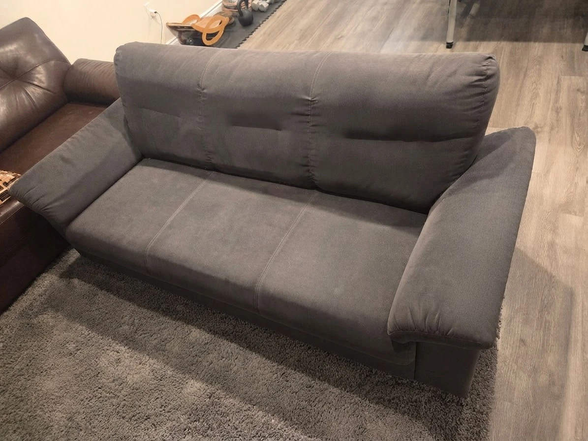 Grey fabric three seater sofa -comes with gray carpet