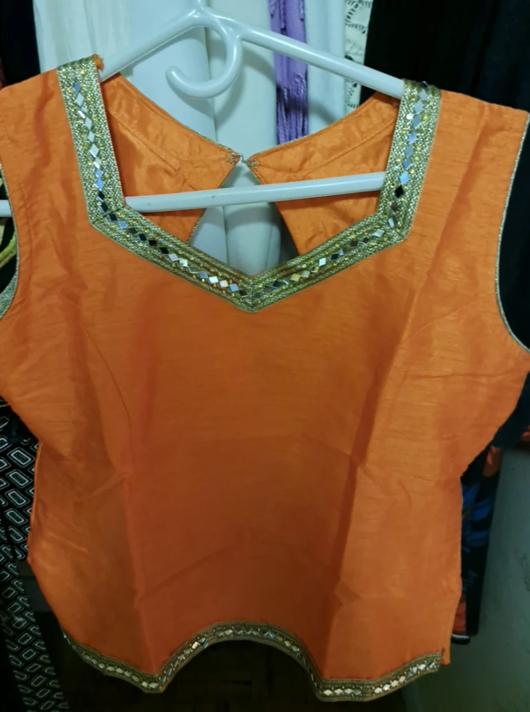 Orange Silk Blend Lehnga, Kurti  and golden net cape - photo 5