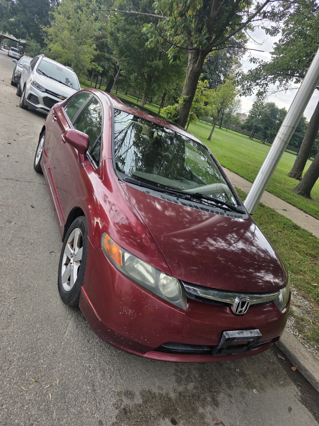 Maroon Honda Civic Sedan
