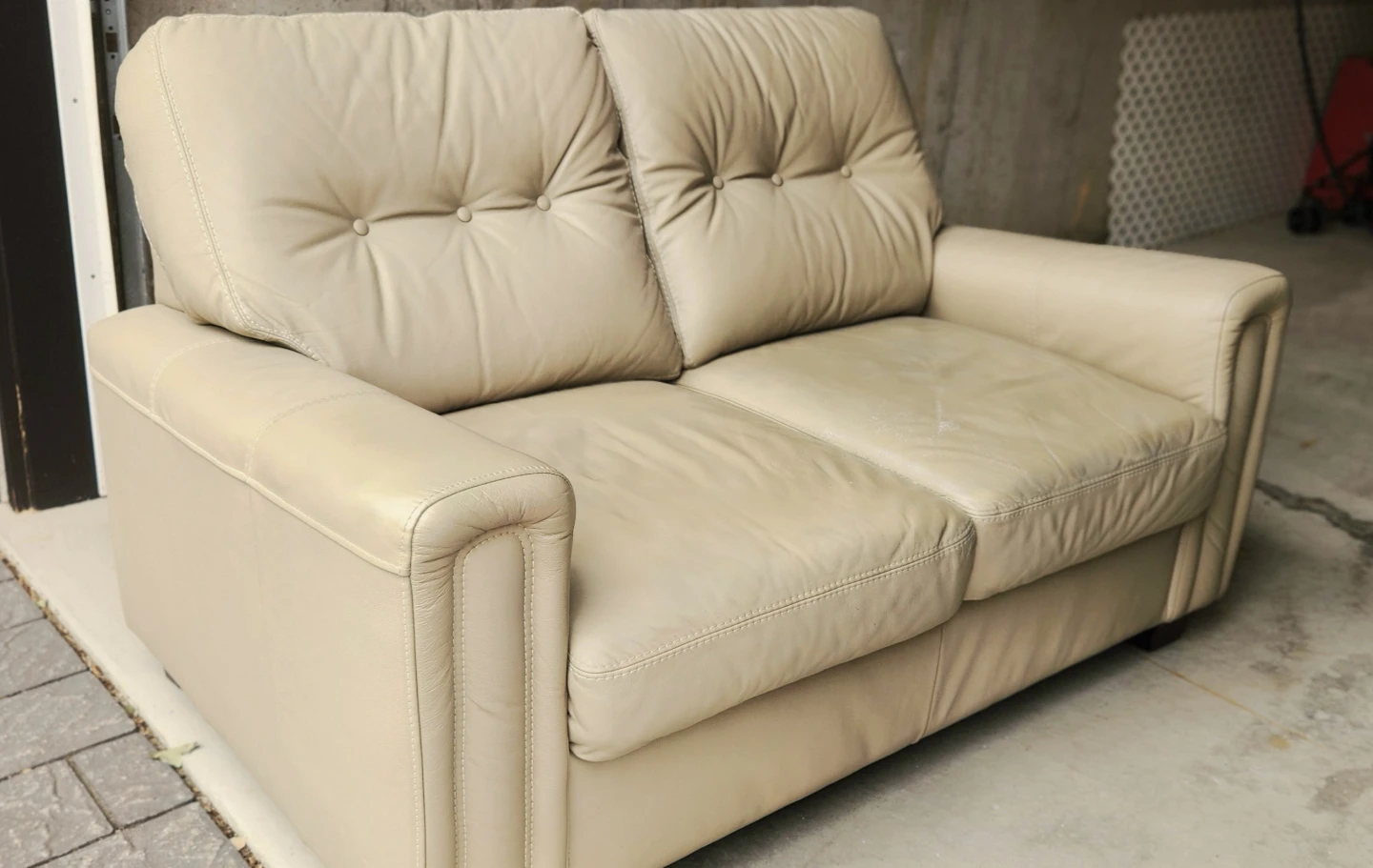 Beige Leather Two-Seater Sofa