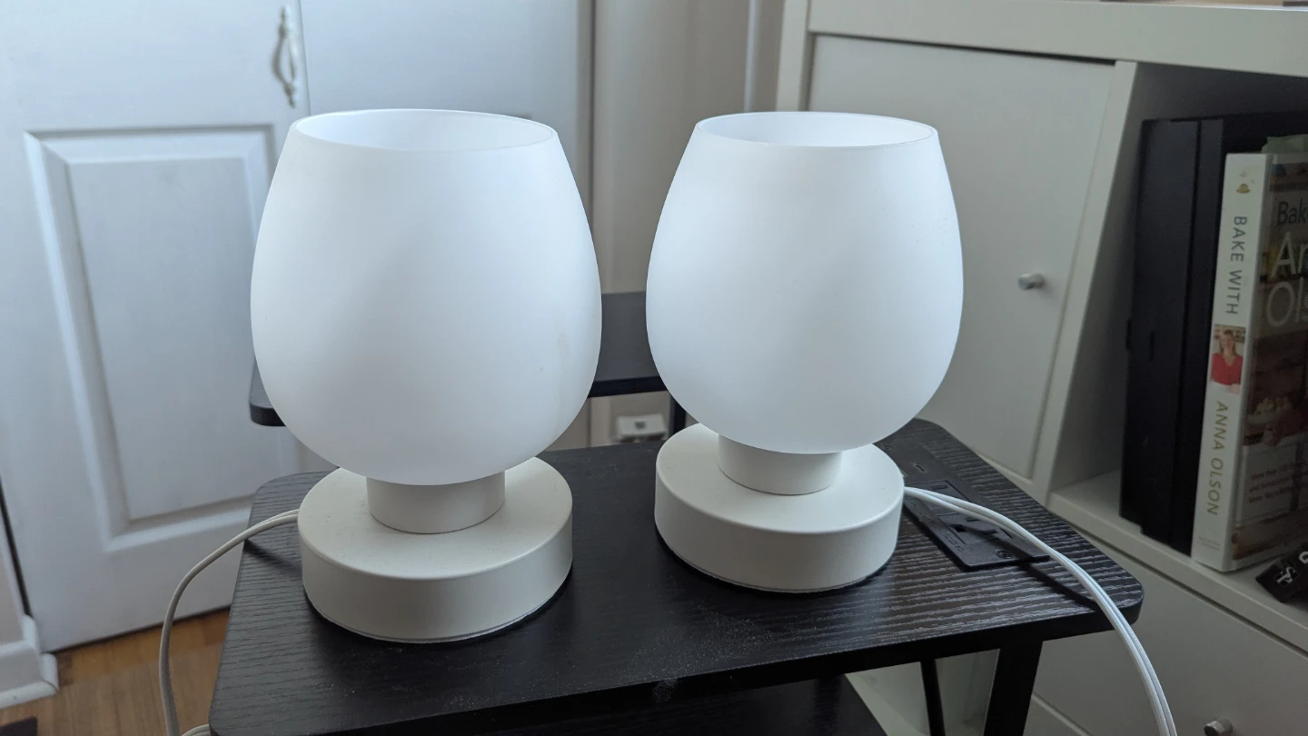 Set of two white frosted glass table lamps