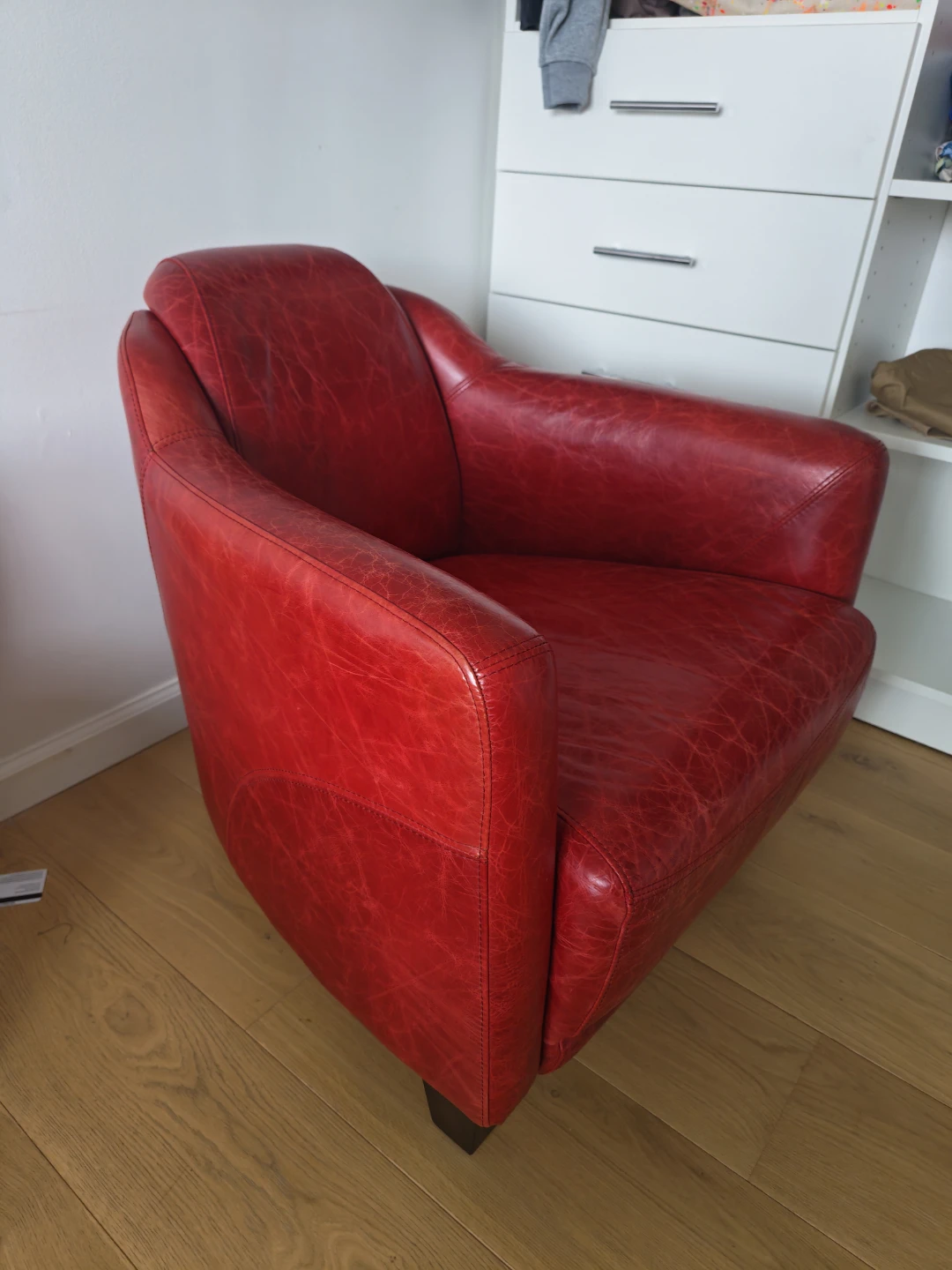 Two Red Leather Accent Armchairs