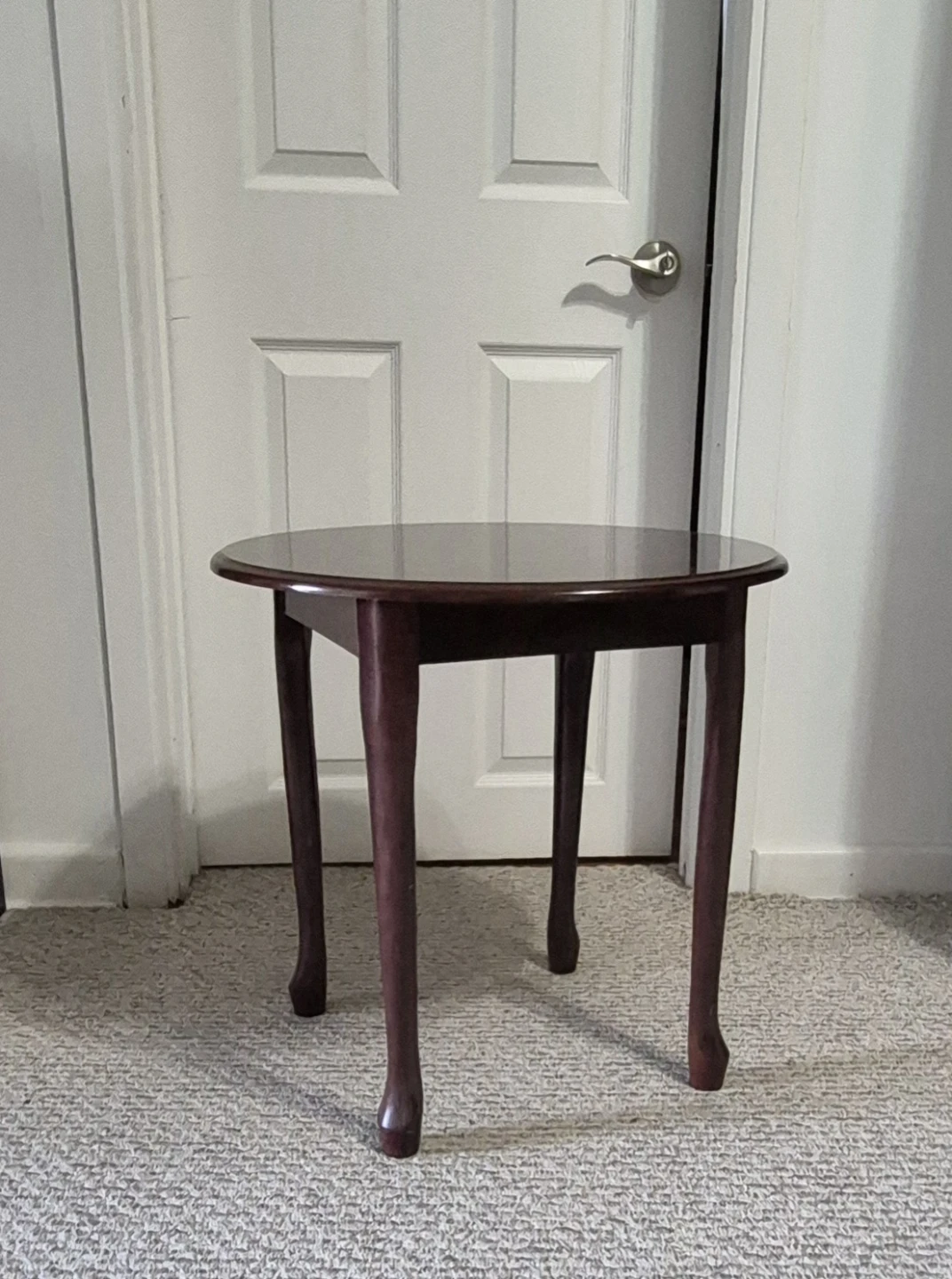 Two wooden side tables