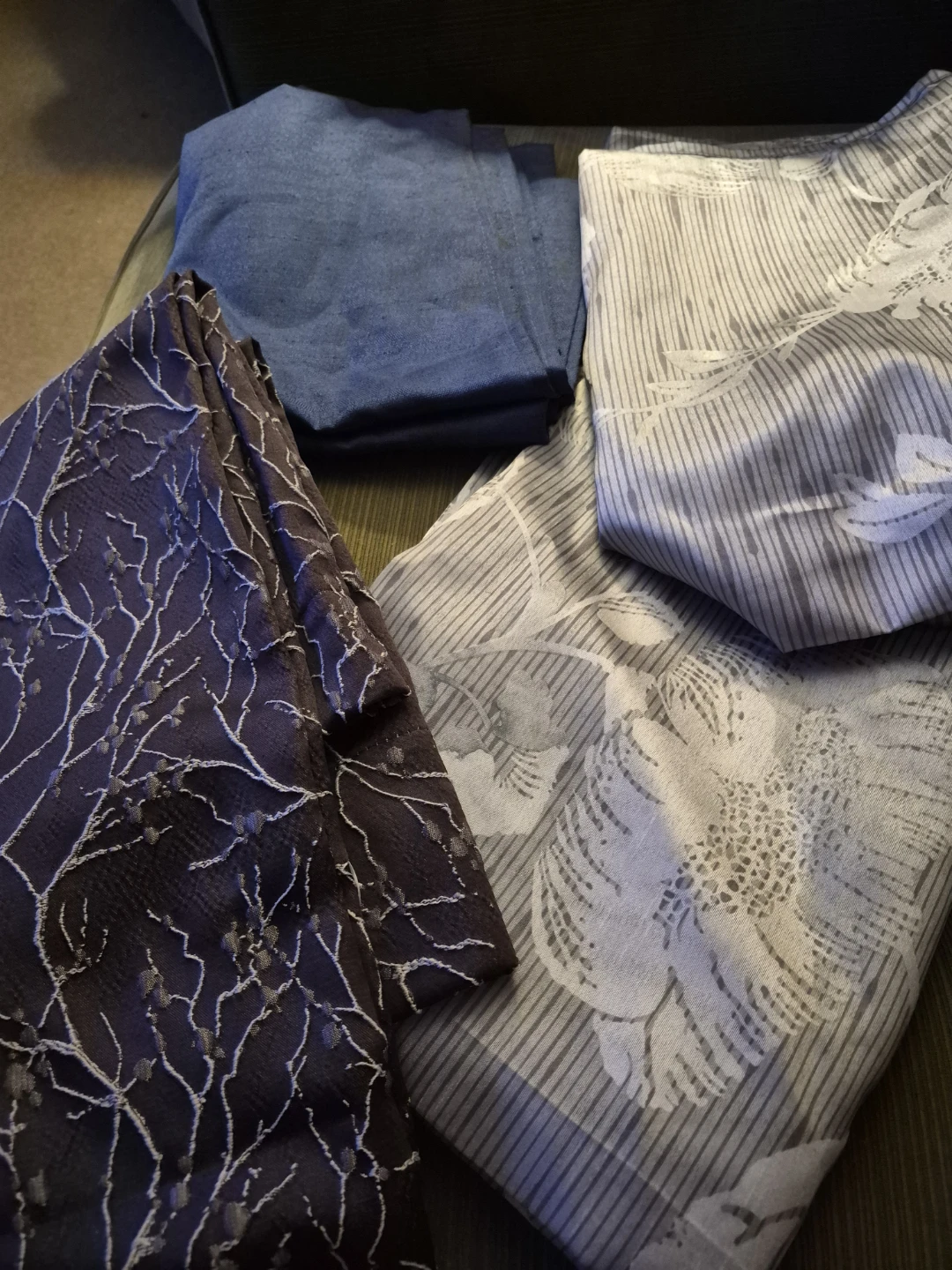 4 drapery panels. 2 same pattern.  1 of each other pattern.