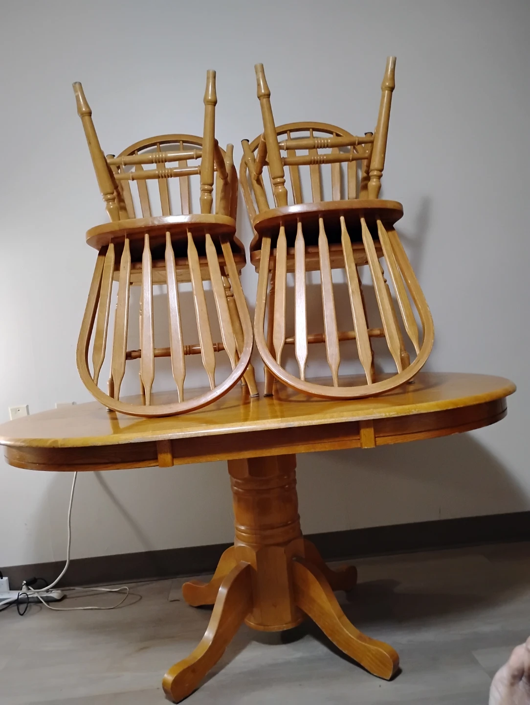 Oak dining table with two chairs