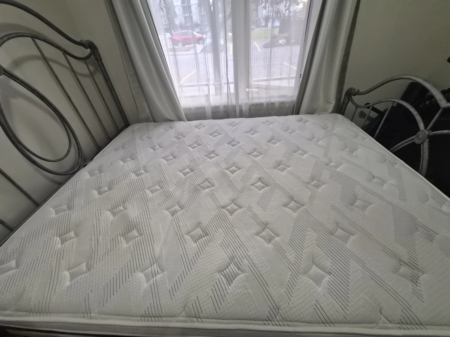 Queen mattress, frame and metal headboard/footboard. - photo 3