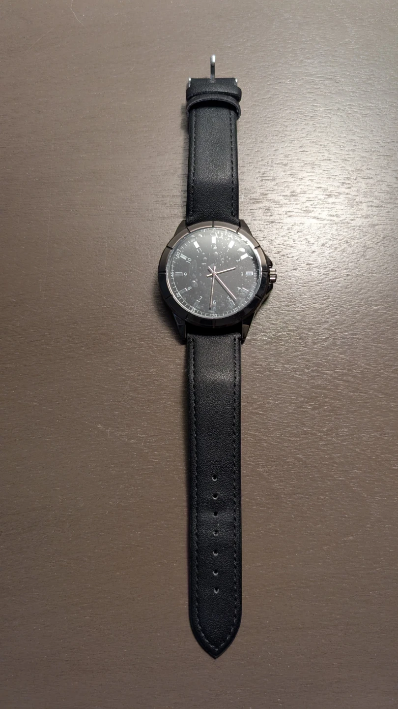 TCK black analog watch