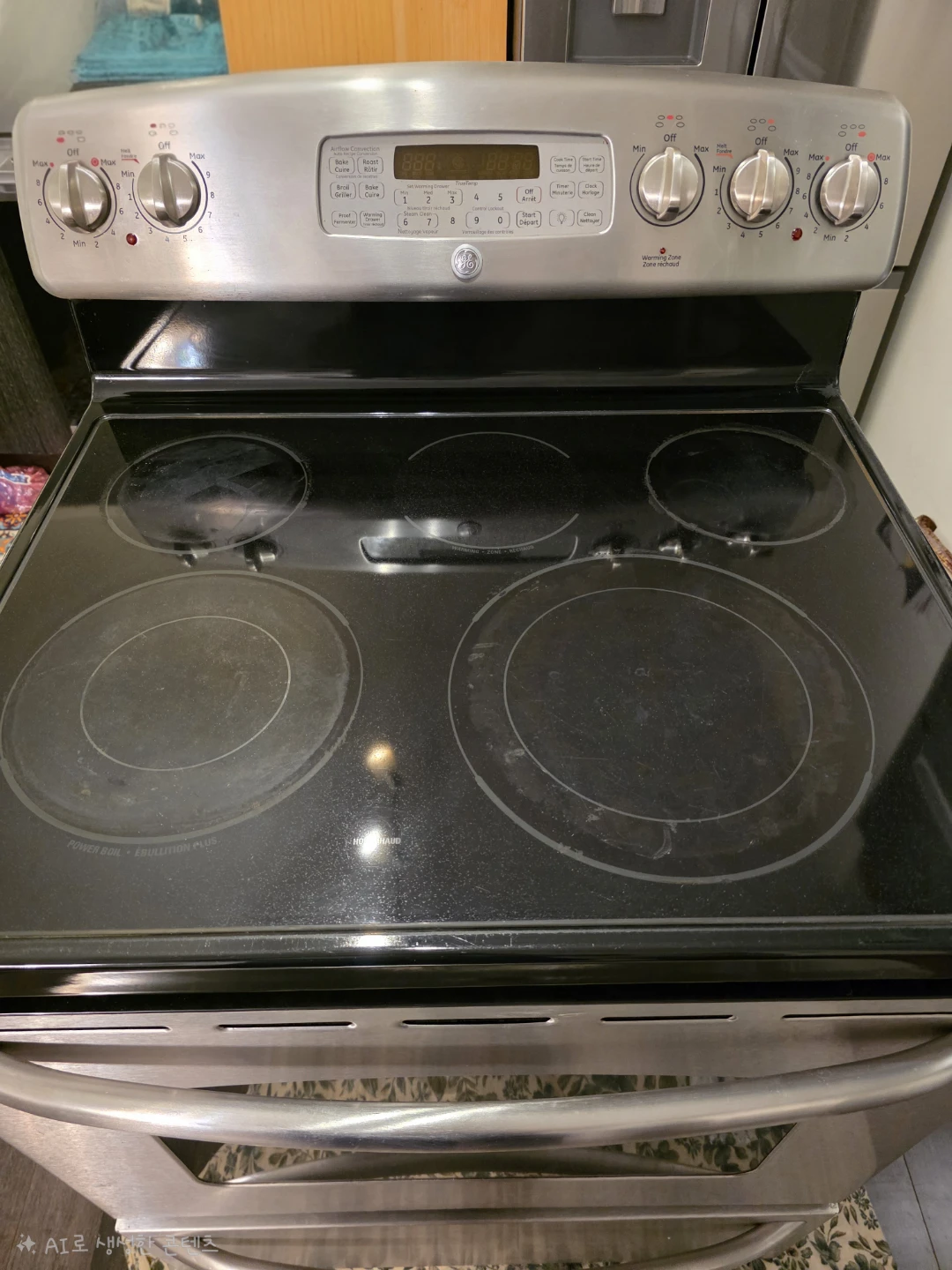 GE 30” Stainless Steel Electric Range - photo 3