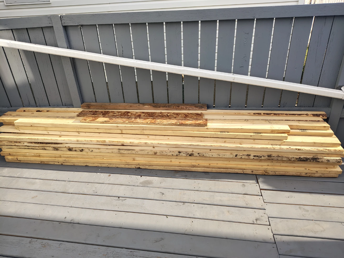 Assorted OSB Sheathing and Dimensional Lumber