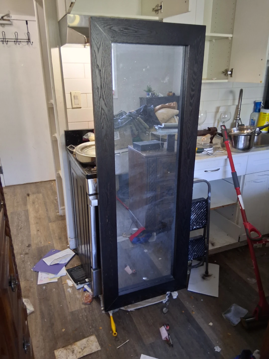 Large black framed floor mirror