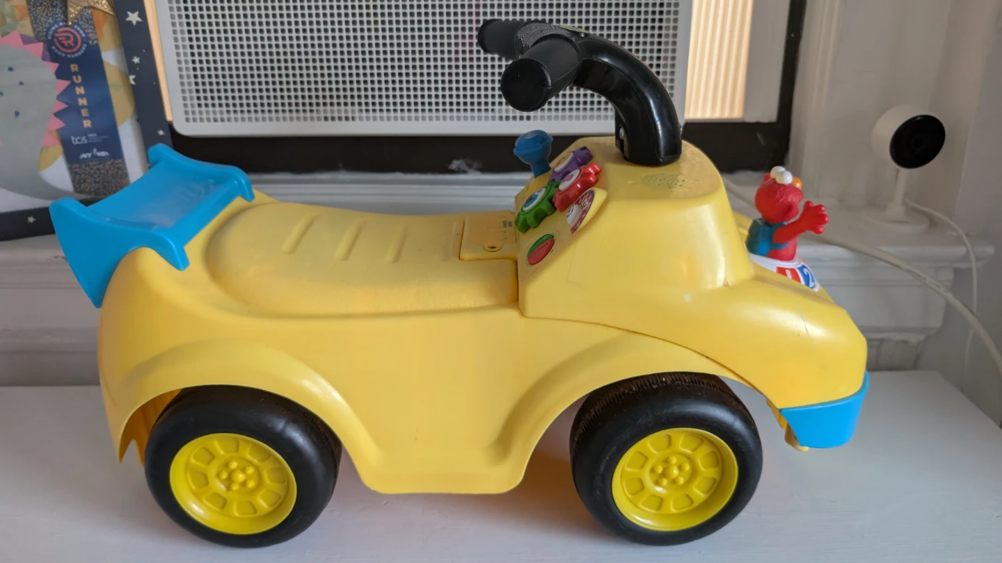 Sesame Street Elmo Ride-On Toy