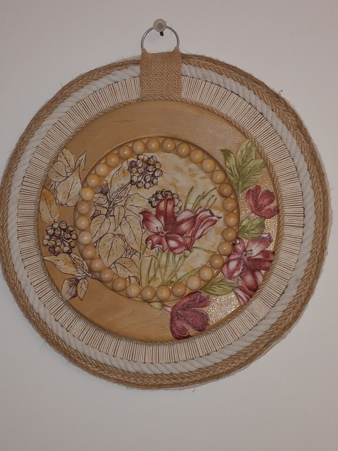 Round Decorative Wall Hanging with Floral Design