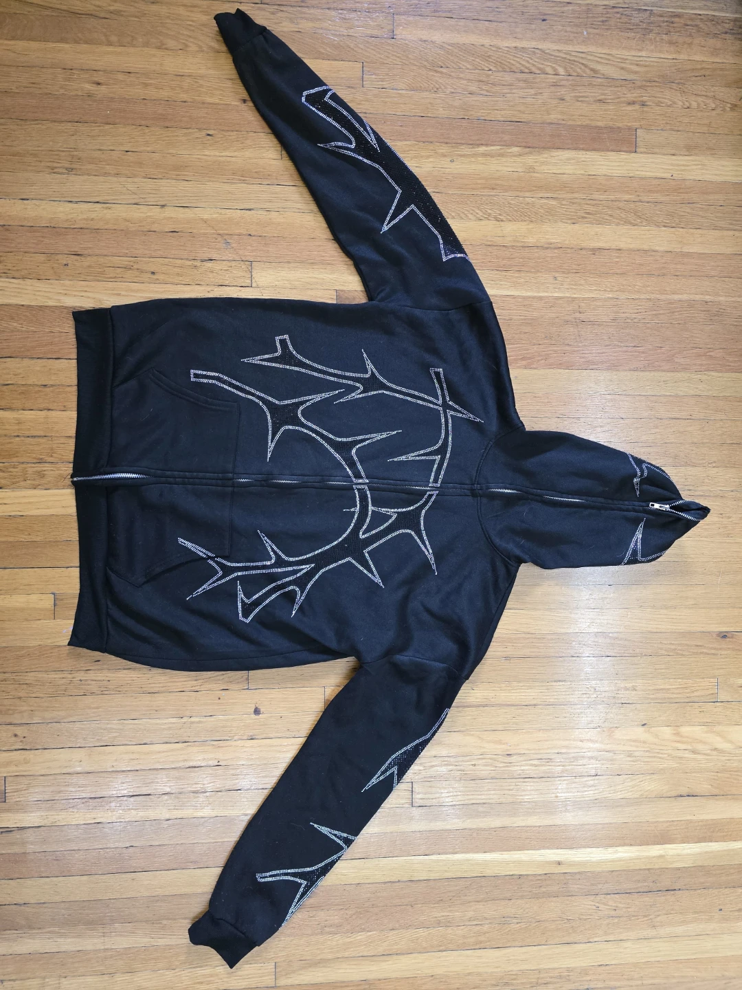 Black Zip-Up Hoodie with Graphic Design