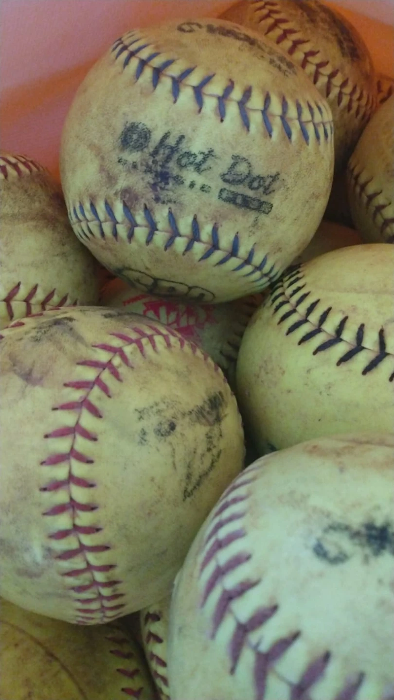 37 Used Softballs