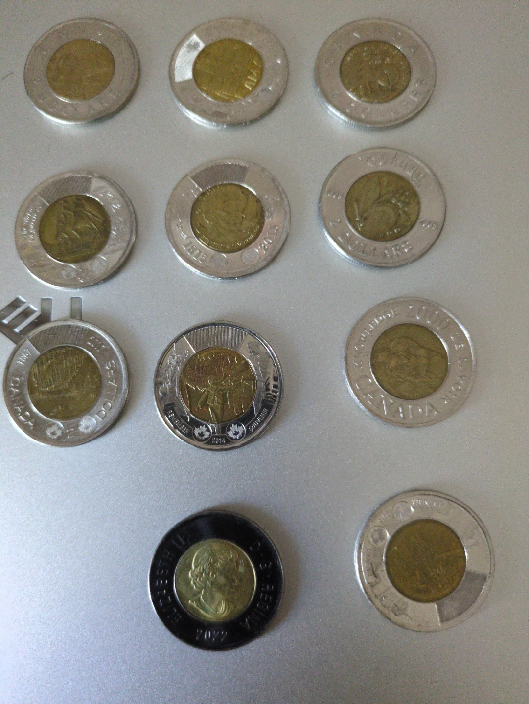 Collection of 11 Canadian Two Dollar Coins