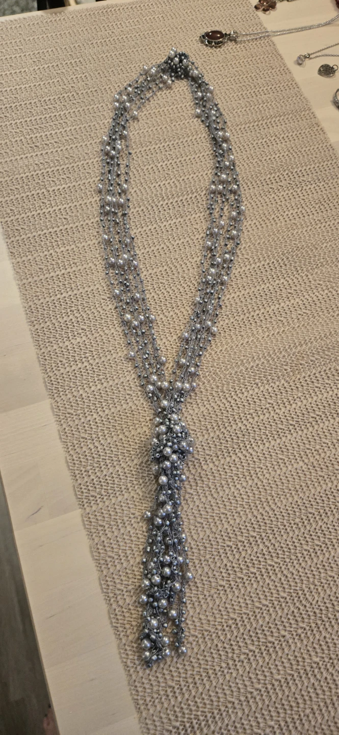 Multi-strand silver-tone necklace with faux pearls