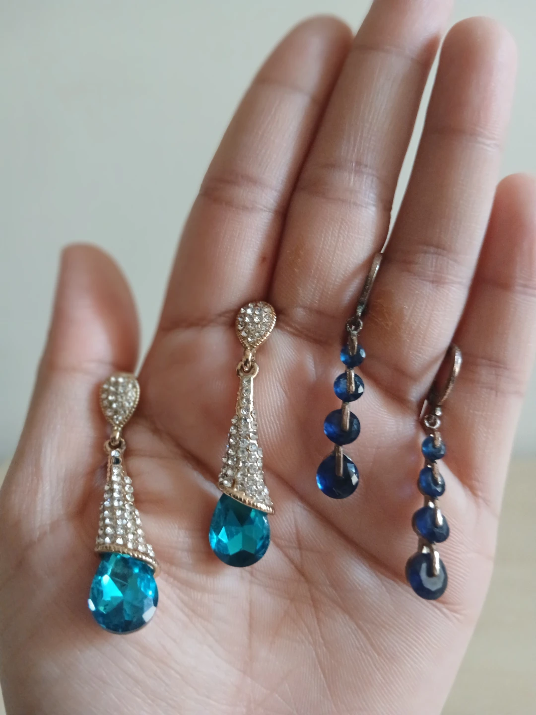 Two pairs of blue statement earrings