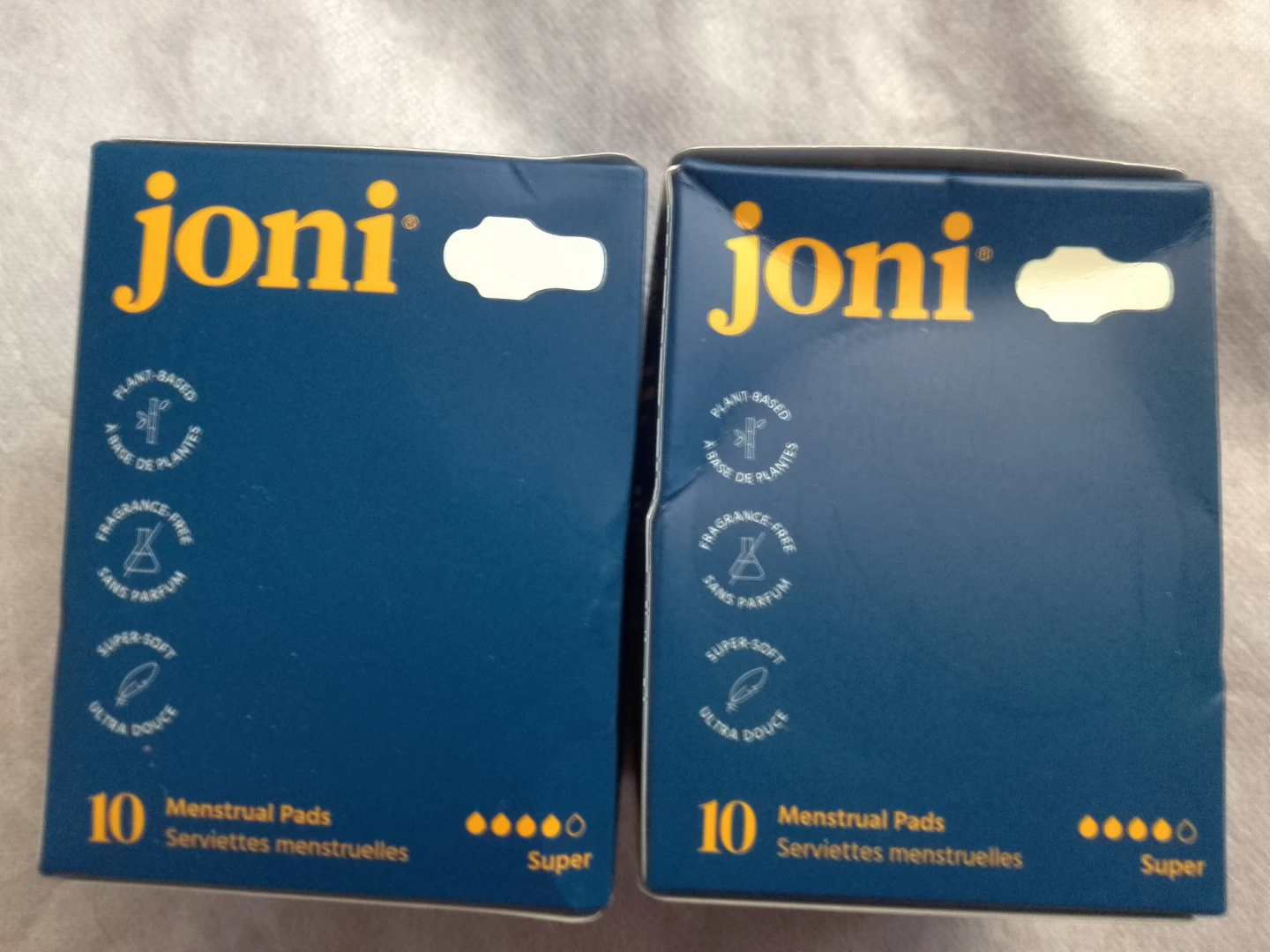 2 boxes of joni Super Menstrual Pads 🏈