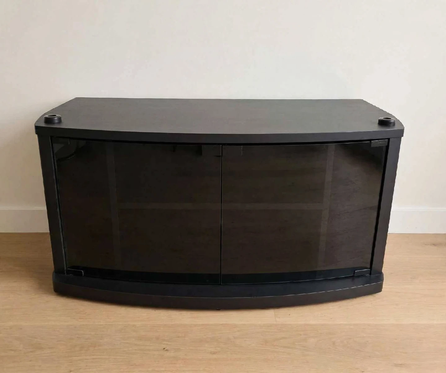 Black TV stand with glass doors