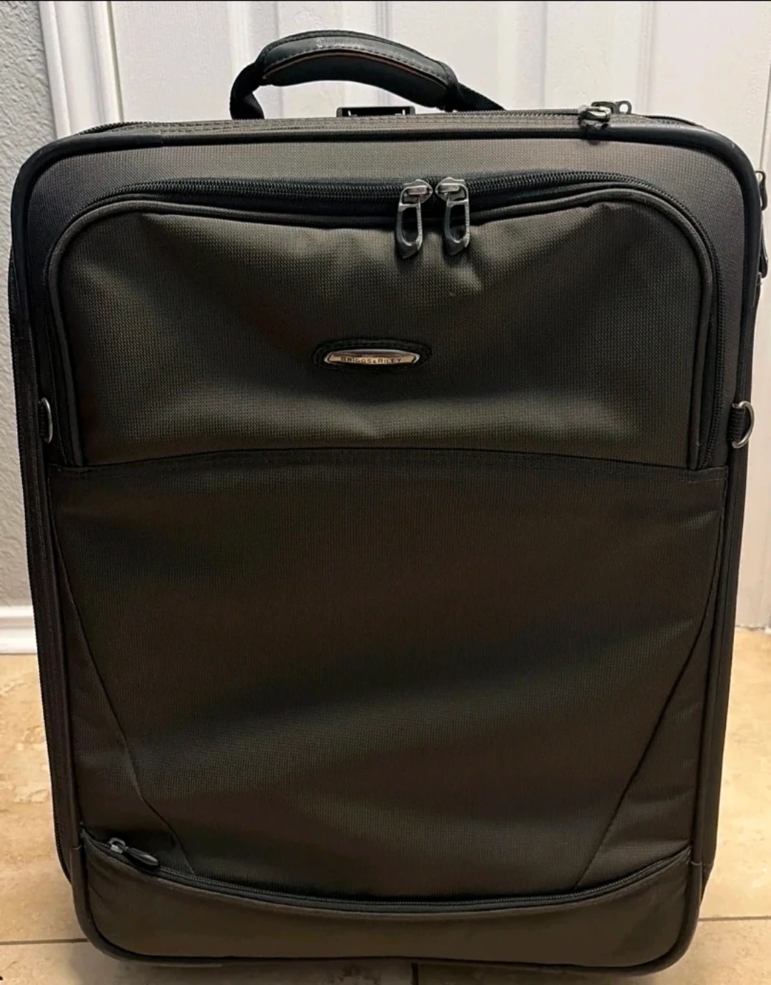 Briggs and Riley Olive 25" checked luggage msrp $1700.