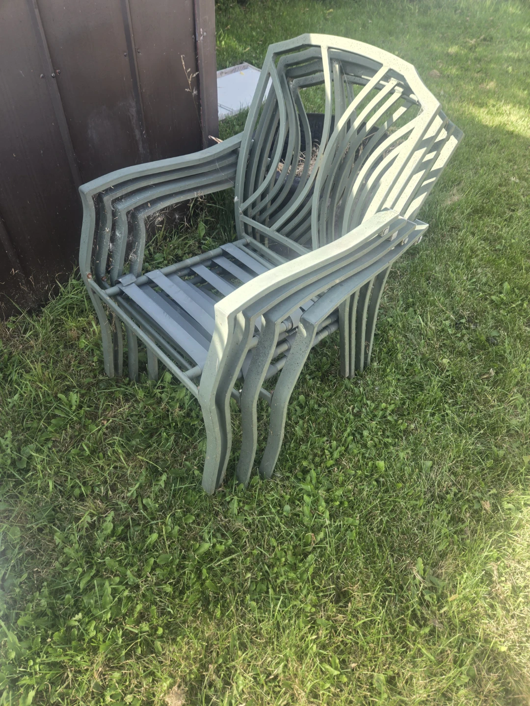 Patio set with glass table and 4 chairs